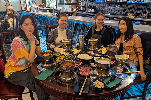 URDU debaters at dinner during the Georgetown tournament.