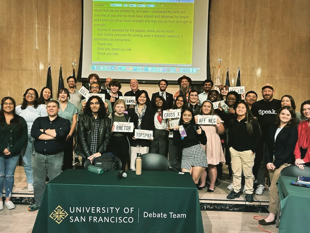 A group of debaters posing for the camera.