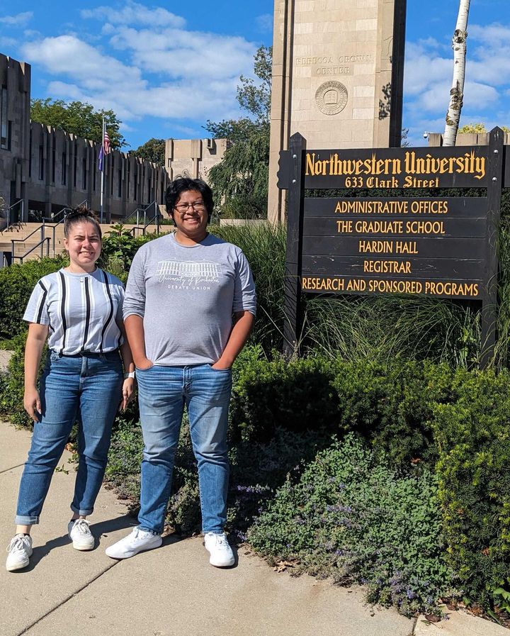 Two participants pose for a photo.