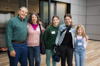 A family of five pose for a photo at the George Eastman Circle Family Celebration, held April 30, 2023, within Washington, DC.
