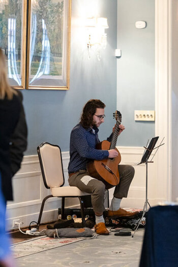 A musician playing a guitar.