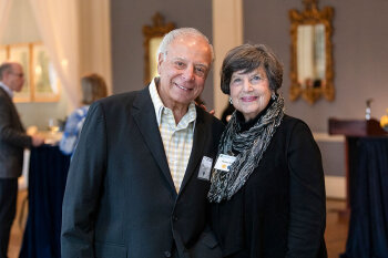 Two individuals posing for a photo.