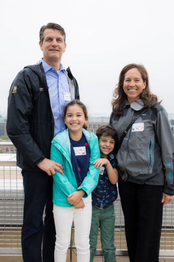 A family of four pose for a photo at the George Eastman Circle Family Celebration, held April 30, 2023, within Washington, DC.