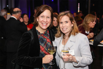 two women posing for photo
