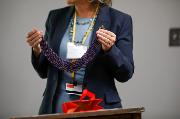 A woman holding a lei