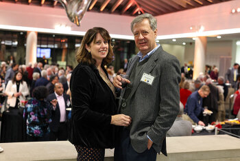 A man and woman pose for a photo