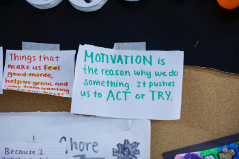 Photo of papers that have sayings on them