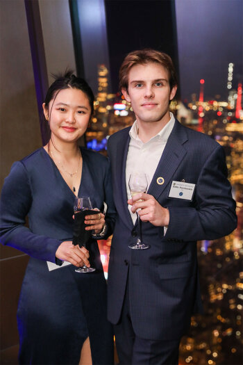 man and woman posing for photo