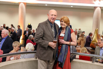 A man and woman pose for a photo