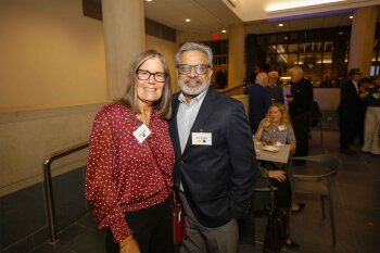 A woman and a man posing for a photo
