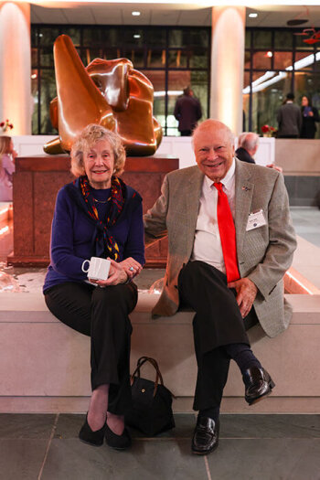 A man and woman pose for a photo