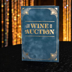 Blue menu that says Wine Auction on it