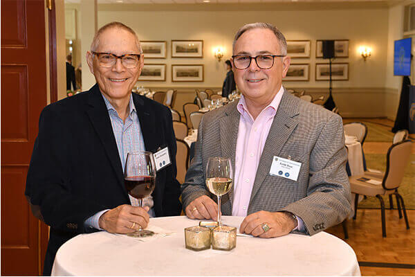 Image of Dr. Mark Taubman and a luncheon guest