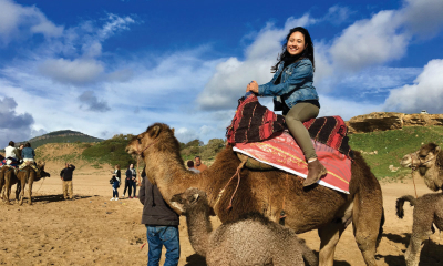 Student pictured riding camel