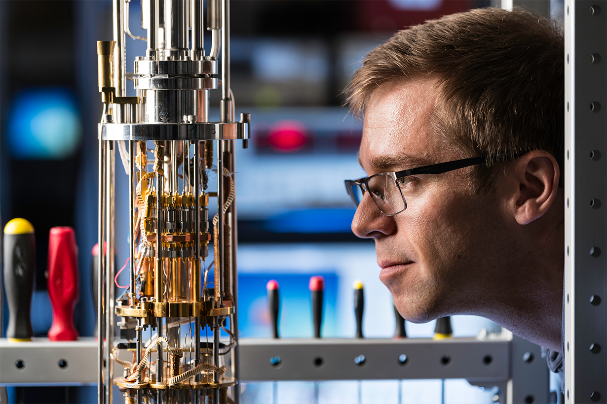 A researcher looks at a quantum instrument.