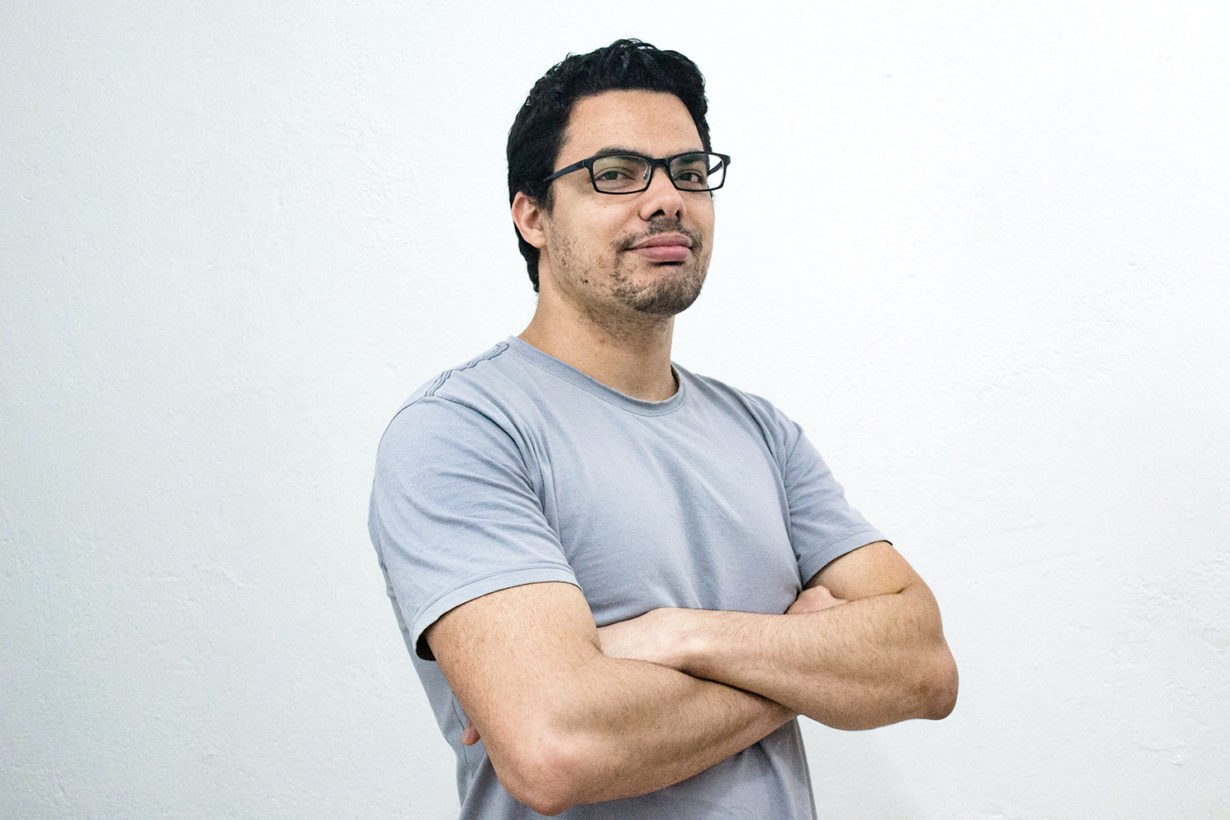 man looking forward and smiling