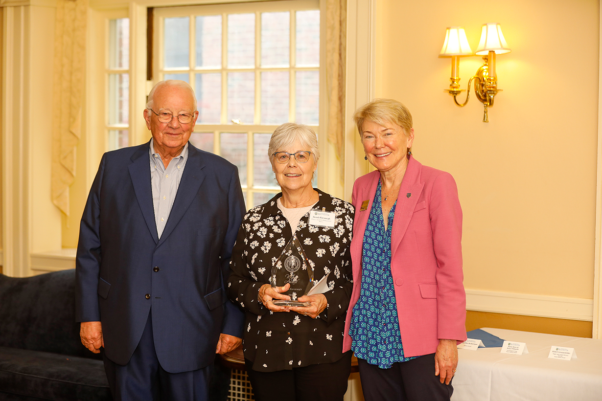Witmer Award winner, Brenda Kavanaugh poses with Tom Richards and President Mangelsdorf.