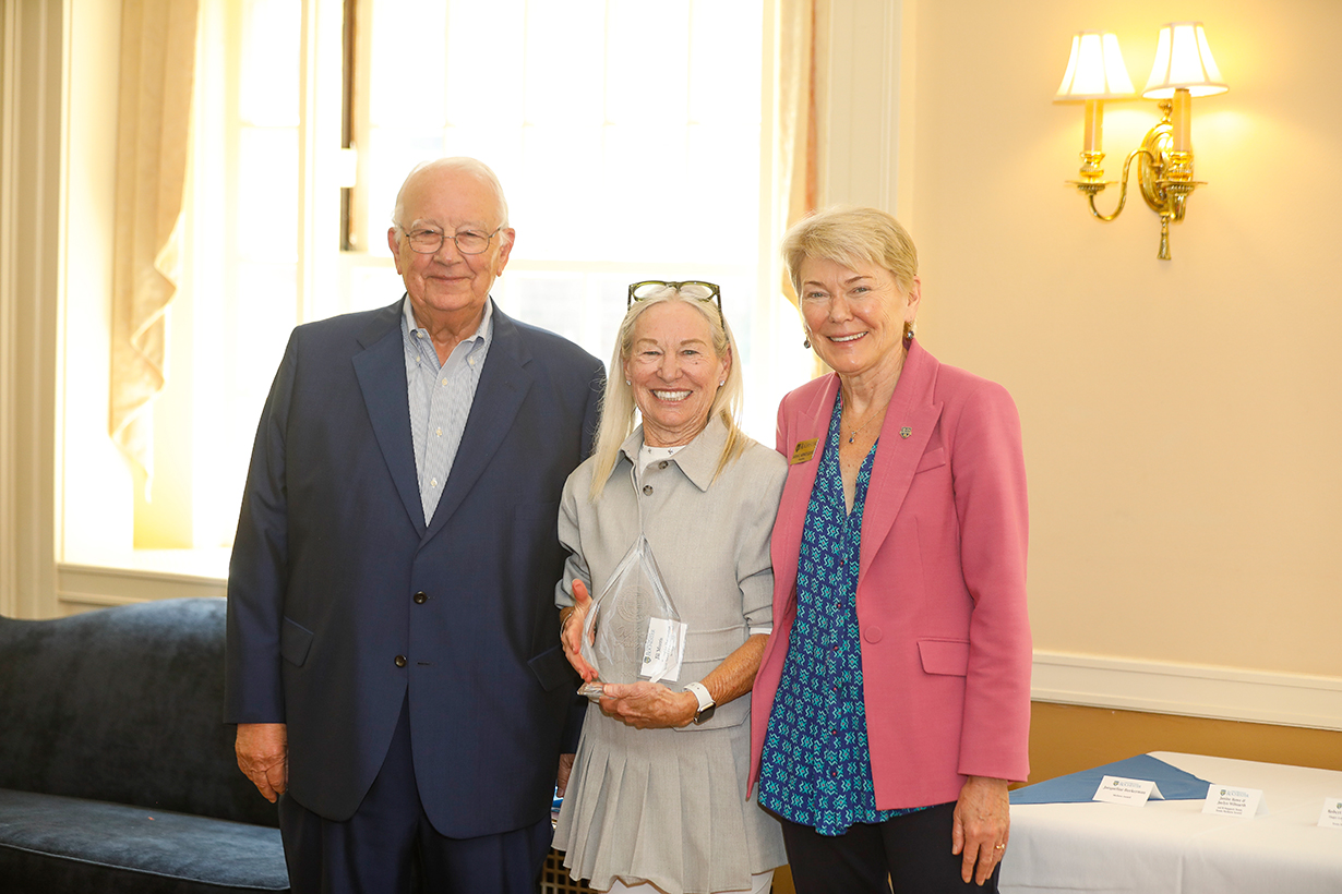 Witmer Award winner, Jill Morris poses with Tom Richards and President Mangelsdorf