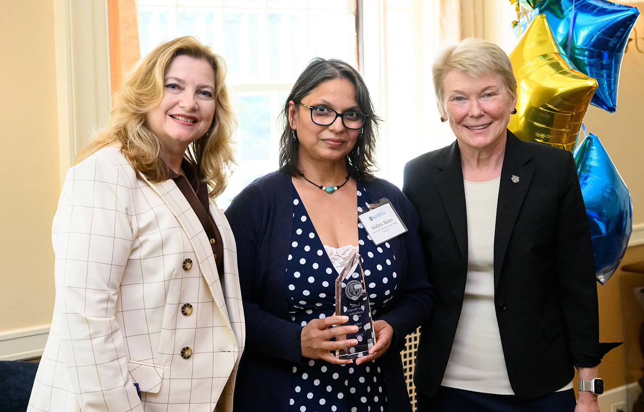 University of Rochester Vice President and Chief Human Resources Officer, Kathleen M. Gallucci (L) and University of Rochester President Sarah Mangelsdorf (R) pose with Lamar Riley Murphy Leadership Award winner Indira Akins of UR medicine urgent care