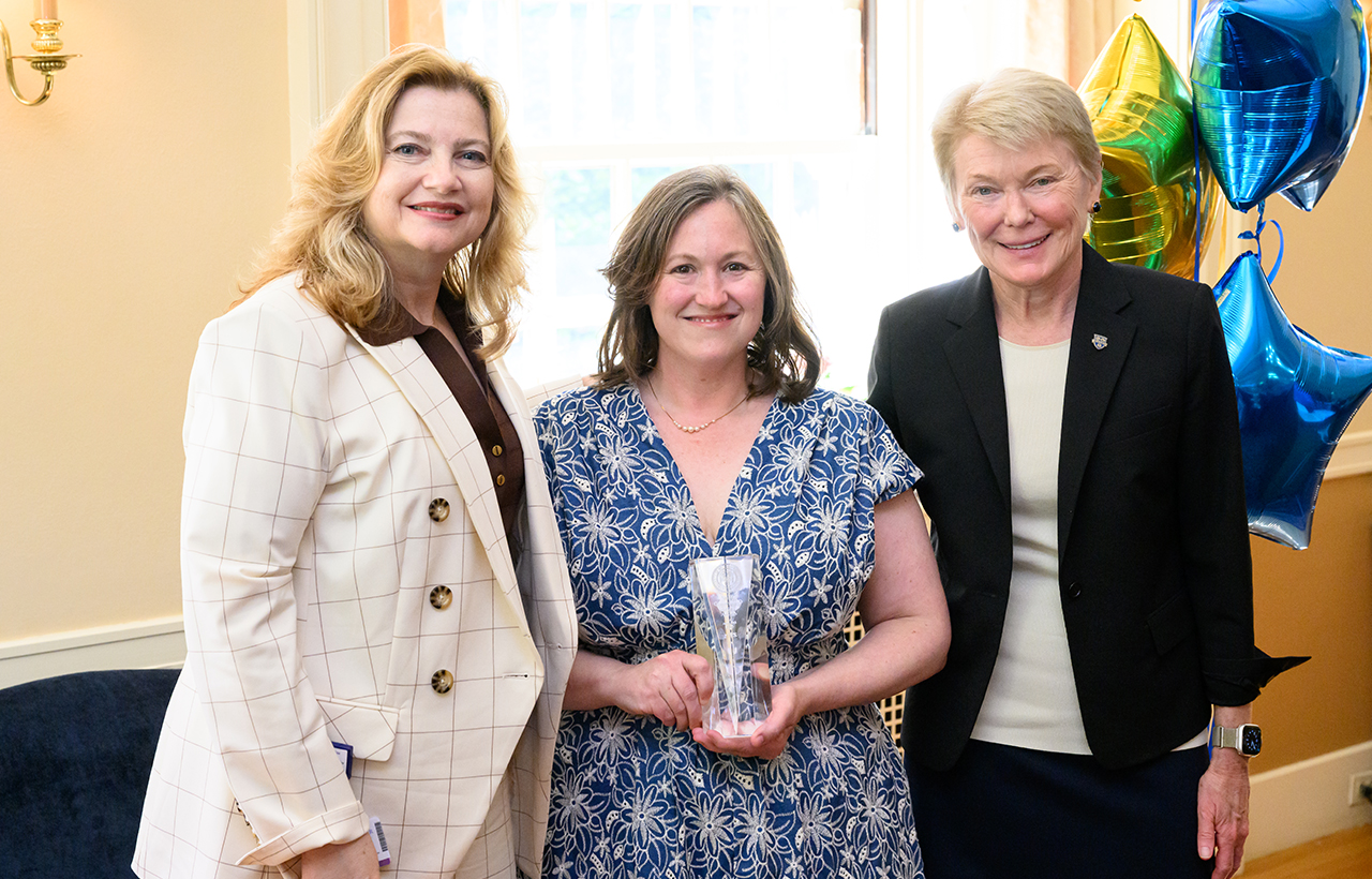 University of Rochester Vice President and Chief Human Resources Officer, Kathleen M. Gallucci (L) and University of Rochester President Sarah Mangelsdorf (R) pose with Staff Community Service Award recipient Jennifer Shaw of the Pharmacy Supply Chain team