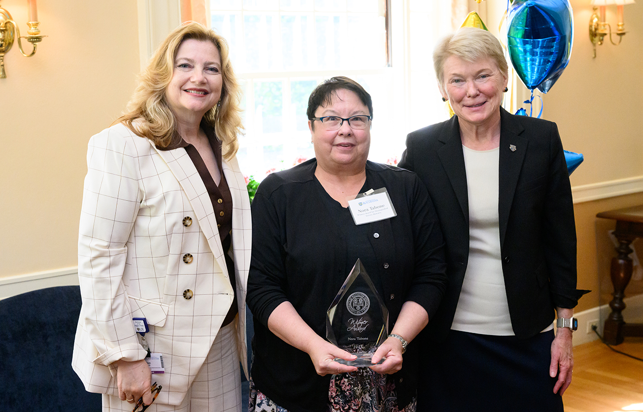 University of Rochester Vice President and Chief Human Resources Officer, Kathleen M. Gallucci (L) and University of Rochester President Sarah Mangelsdorf (R) pose with Witmer Award for Distinguished Service winner Nora Tabone of Medical Center Finance
