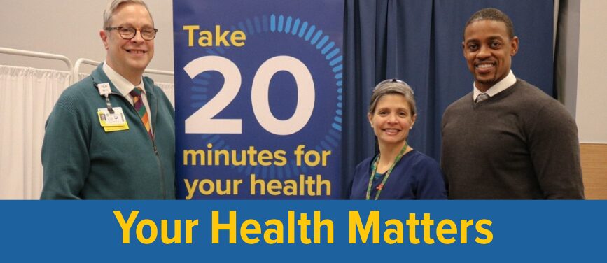 Leaders standing next to a banner, 'Take 20 minutes for your health.' With bottom text, 'Your Health Matters.'