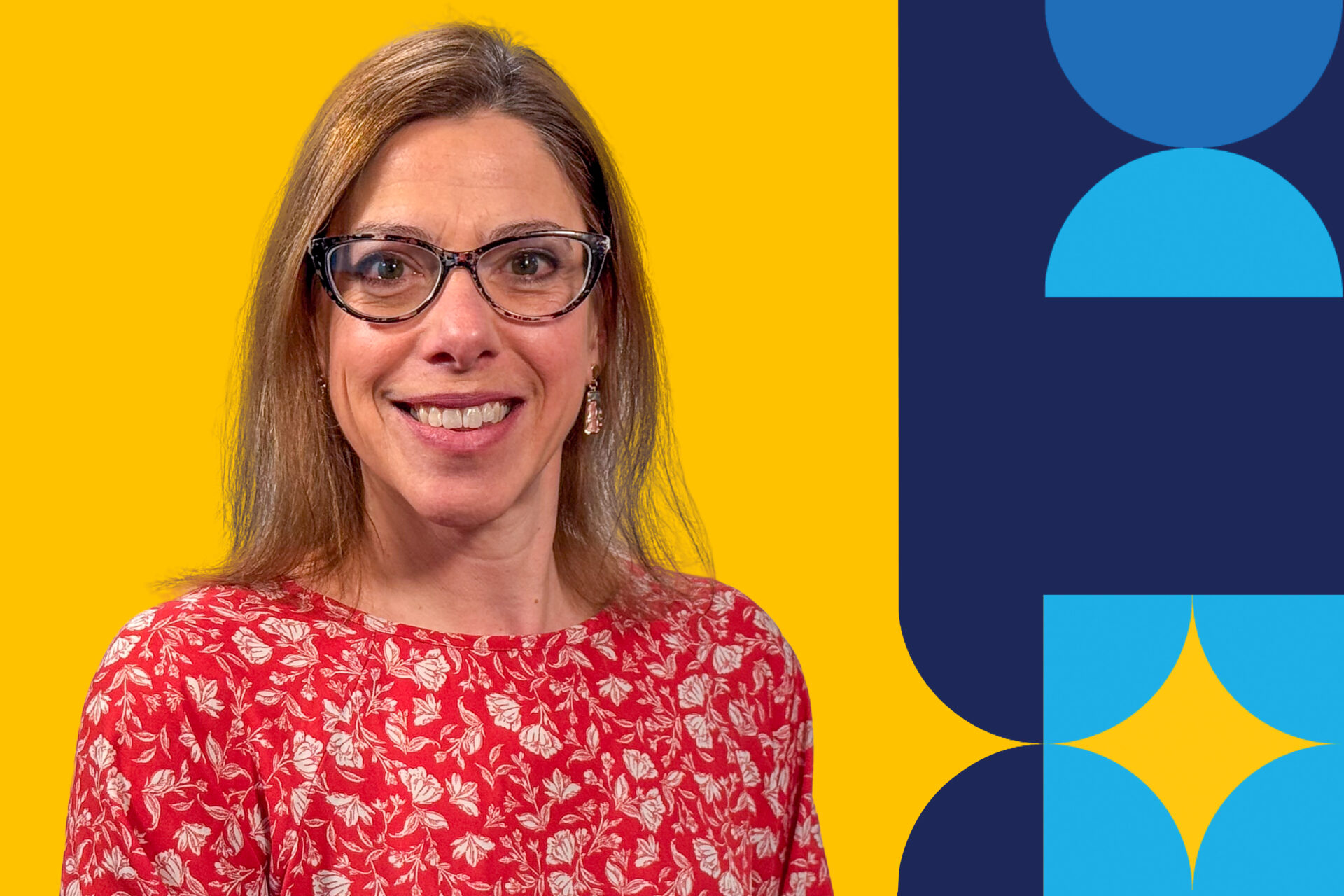 A smiling woman named Elibabeth Keller wearing a patterned red shirt and glasses in front of a yellow background.