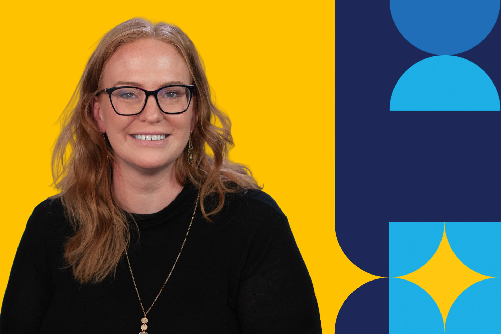 A woman named Denise backer smiling brightly in front of a yellow background.