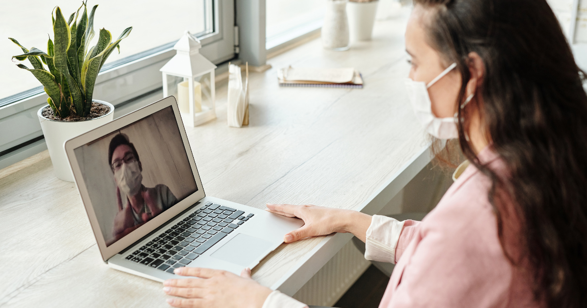 Two individuals having a Zoom meeting.