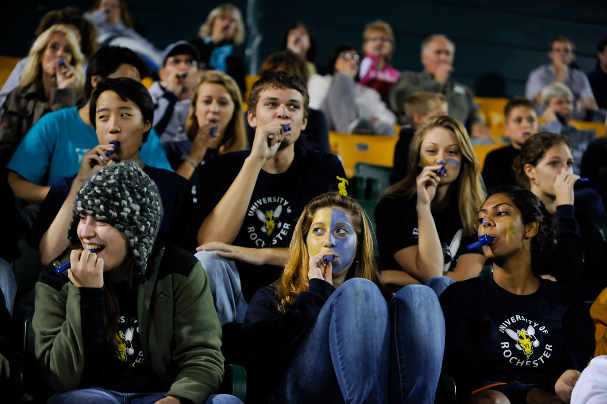 students at football game