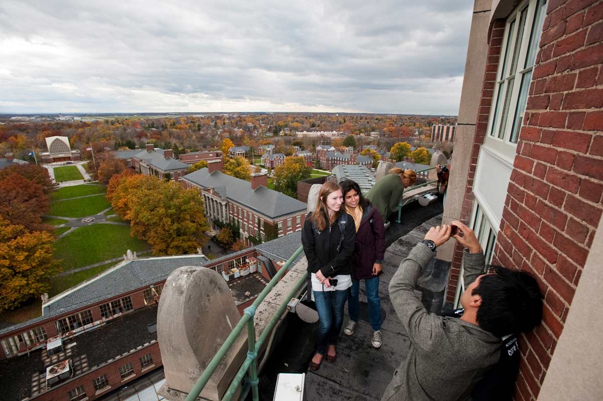 taking photos on top of Rush Rhees tower