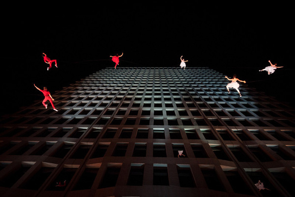andaloop perform on the side of the HSBC Building