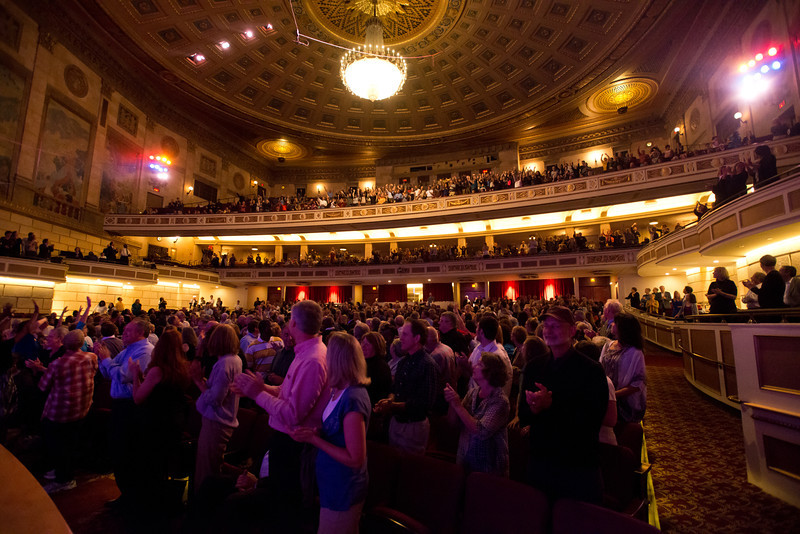 crowd giving a standing ovation