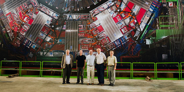 Feature image scientists in front of large Hadron collider