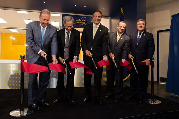 University, state, and local officials cut the ribbon at the Blue Gene computing facility