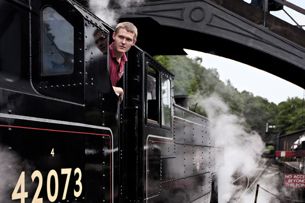 Feature image student aboard a steam train
