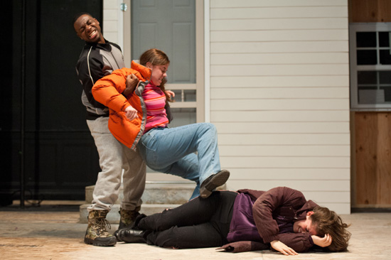 Feature image man pulling a kicking woman off another woman