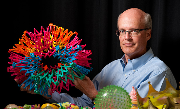 Feature image Richard Aslin with child toys