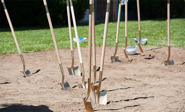 Feature image shovels sticking in the ground