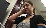 Feature image sitting girl, holding her head