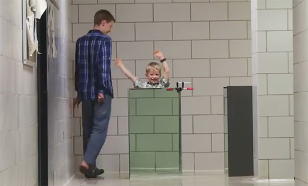 Feature image boy waving, his lower body made invisible by mirrors