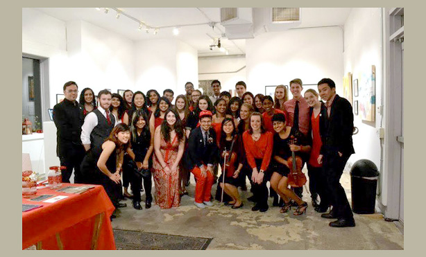 Feature image students dressed in red and black