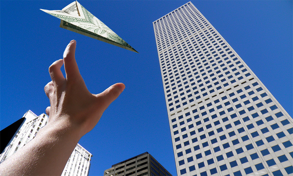 Feature image trying to catch a dollar bill