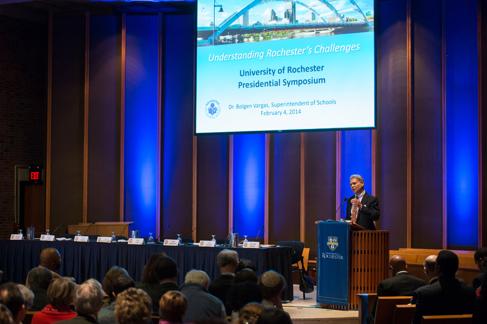 Feature image Bolgen Vargas at the podium in the Interfaith Chapel
