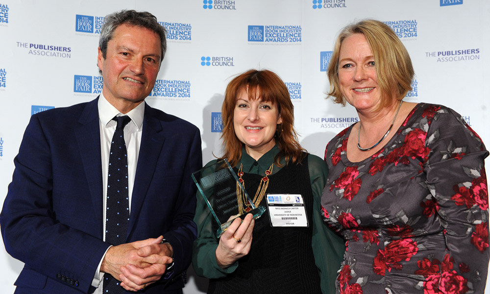 Feature image Three people posing with award.