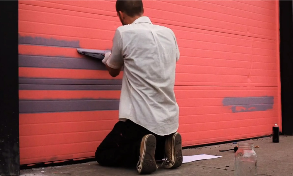 Feature image graffiti artist painting a wall