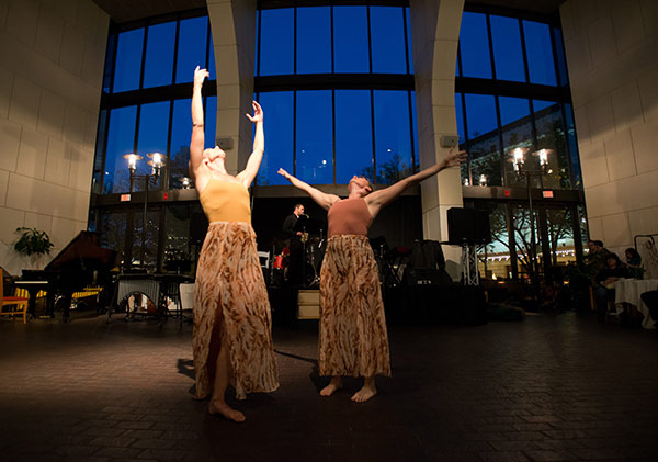 Feature image two women dancing in a spacious foyer