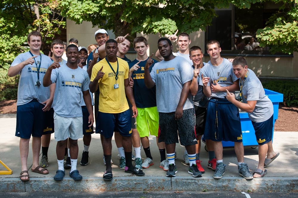 football players pose for a photo