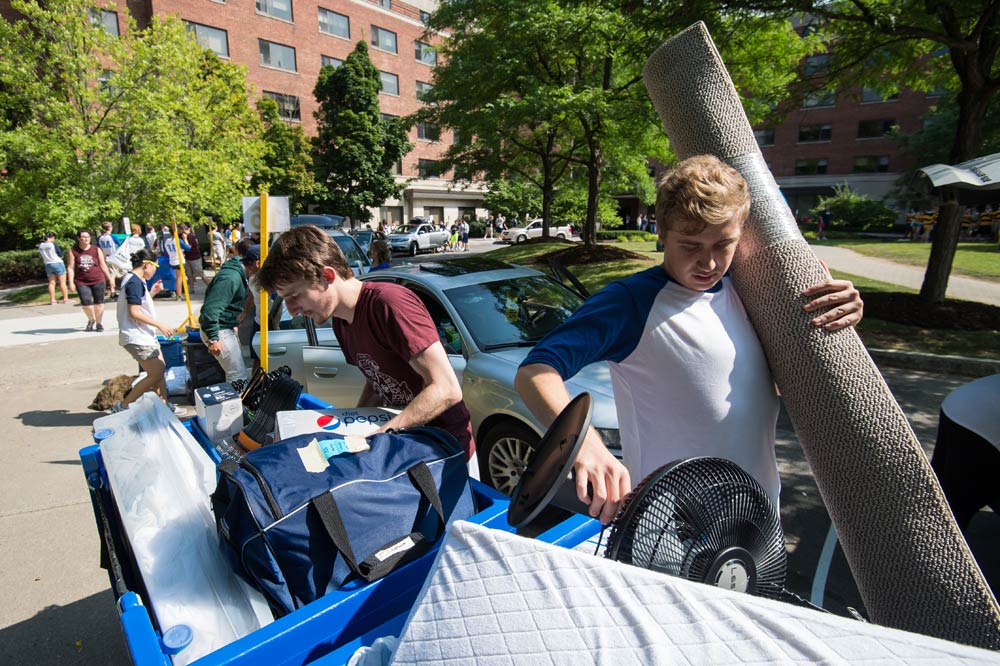 students living carpet and other belongings