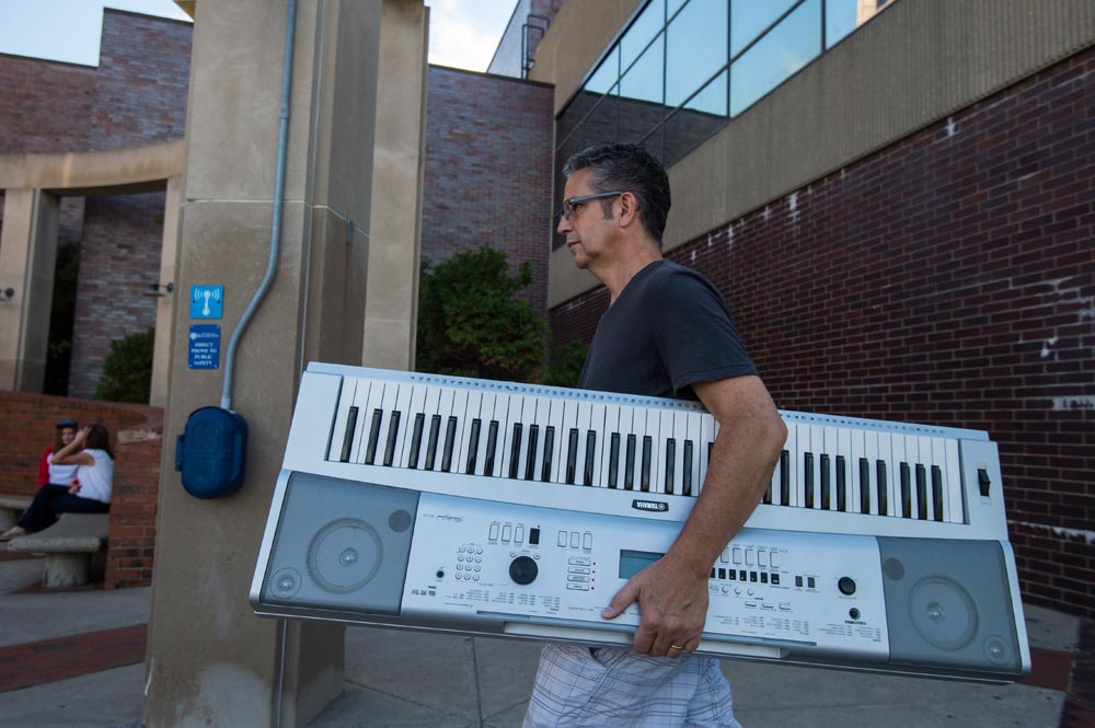 dd carrying an electronic keyboard